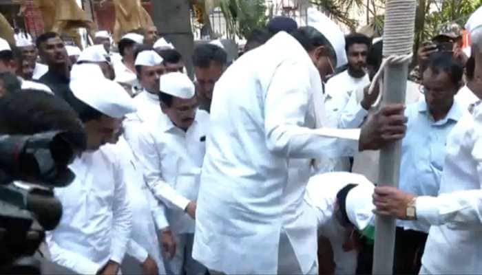 Outage As Cong Worker Removes Siddaramaiah's Shoes Holding National Flag