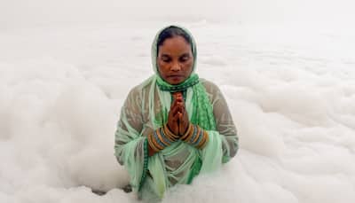  First Day Of Chhath Puja: Devotees Take Holy Bath In Polluted Yamuna