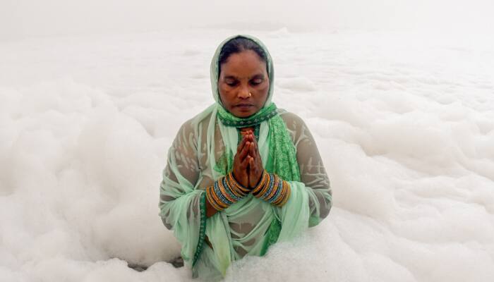  First Day Of Chhath Puja: Devotees Take Holy Bath In Polluted Yamuna