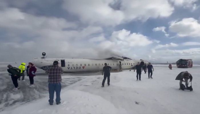 Delta Plane Crash Jet Overturns In Canada's Toronto Pearson Airport