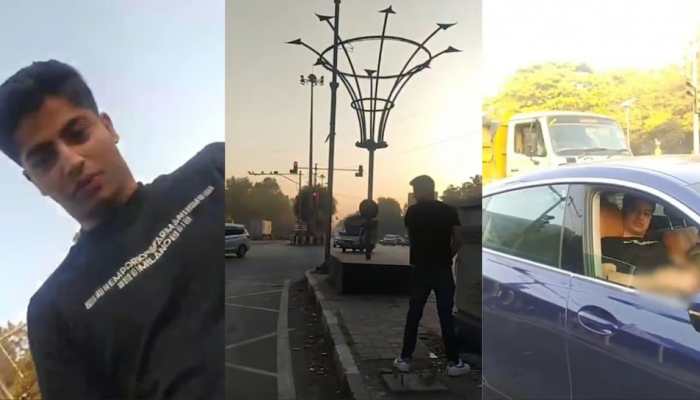 ‘Drunk’ Pune Man Alights From BMW, Urinates On Road; Cops Launch Probe After Video Goes Viral ‘Drunk’ Pune Man Alights From BMW, Urinates On Road; Cops Launch Probe After Video Goes Viral