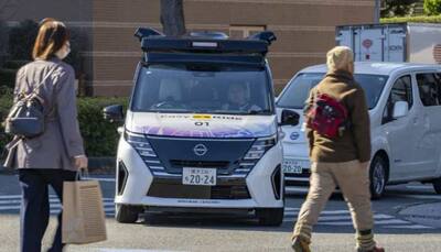 Japan's Nissan Tests Driverless Vehicles In City Streets Filled With Cars And People