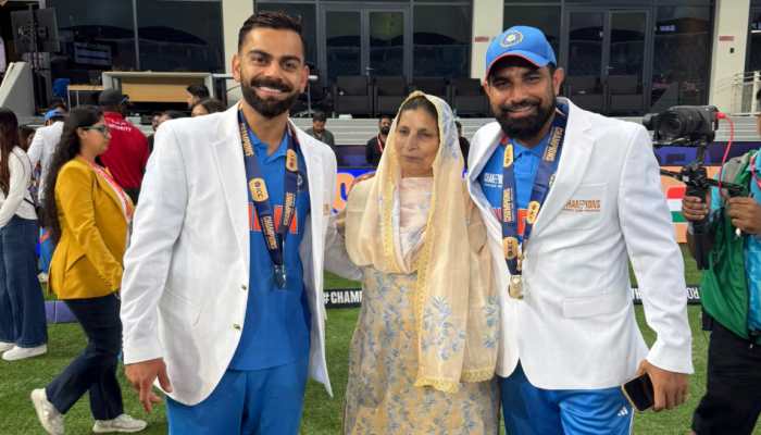 Virat Kohli Touches Feet Of Mohammed Shami's Mother After Champions Trophy Win, Wins Hearts - WATCH Virat Kohli Touches Feet Of Mohammed Shami's Mother After Champions Trophy Win, Wins Hearts - WATCH