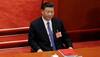 China Raises Flag On Disputed Reef Near Philippine Base, Escalating Tensions In South China Sea