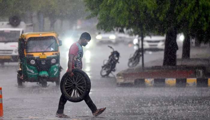 IMD Issues Rain Alert For South, Northeast, And Delhi; Heatwaves To Grip UP, Rajasthan And MP IMD Issues Rain Alert For South, Northeast, And Delhi; Heatwaves To Grip UP, Rajasthan And MP