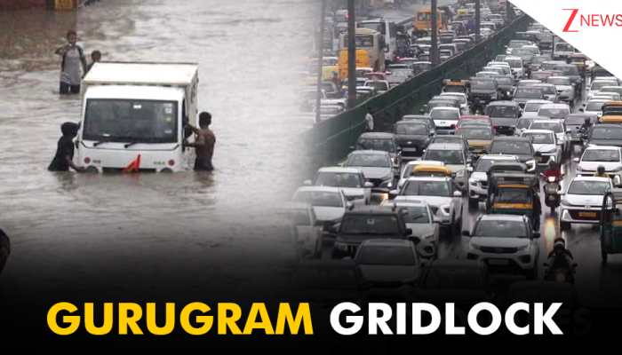 Gurugram Gridlock: Overnight Rains Trigger Massive Waterlogging, Crippling Morning Commute | VIDEO Gurugram Gridlock: Overnight Rains Trigger Massive Waterlogging, Crippling Morning Commute | VIDEO