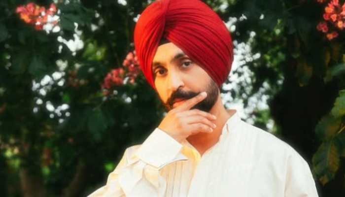Diljit Dosanjh Smiles And Waves At Paparazzi During His 1st Public Appearance After ‘Sardaar Ji 3’ Row