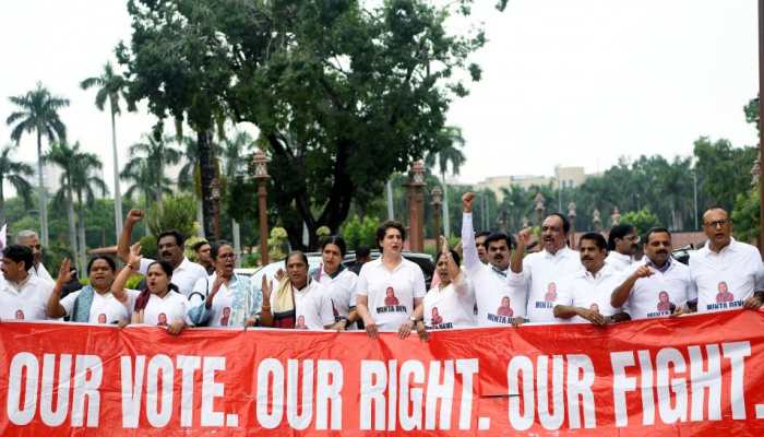 From Onions Garland To '124 Not Out': Why INDIA Bloc's T-Shirt Protest Took Center Stage In Parliament?