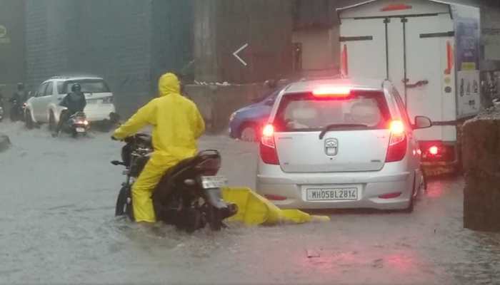 Mumbai Rains: Two Dead In Landslide; Flights, Trains Delayed