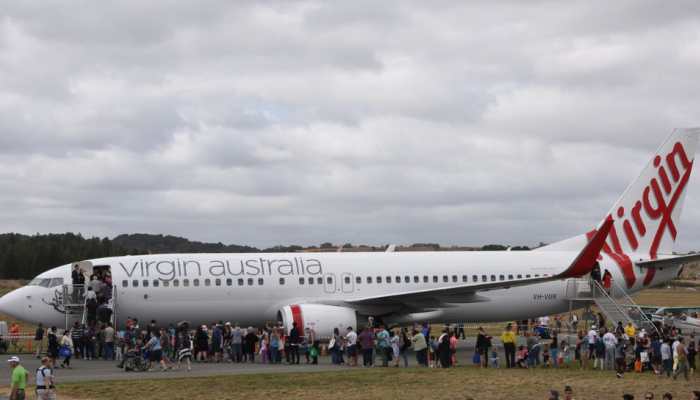 Sky-High Chaos: Virgin Australia Fliers Forced To Pee In Bottles Mid-Flight