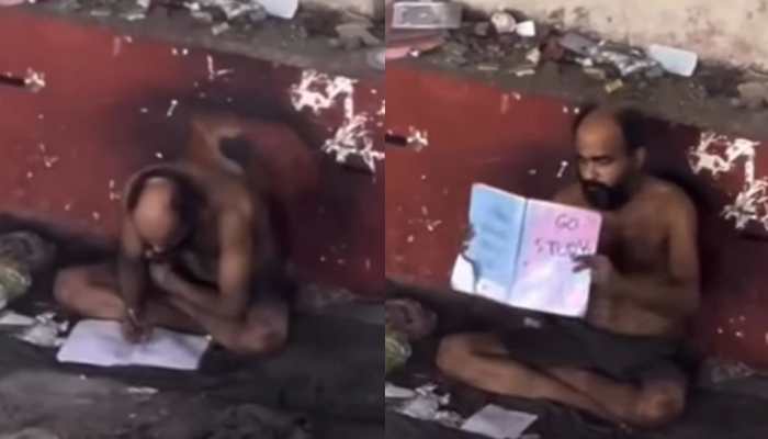 ‘May This Video Never Reach My Mother’: Netizens On Homeless Man Studying Outside Delhi Metro Station | Watch