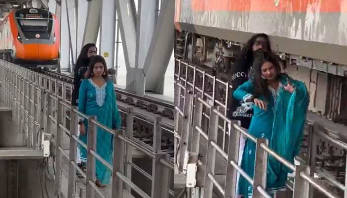 Couple Risks Everything For Viral Reel As Train Speeds By: ‘The Last Dance’, Watch As Clip Makes Round On Social Media