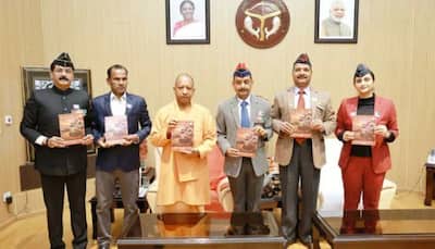 UP CM Yogi Adityanath Marks Armed Forces Flag Day, Unveils Flag Pin And Souvenir