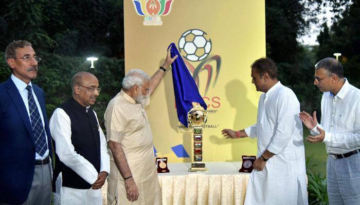Prime Minister Narendra Modi unveils BRICS U-17 football trophy